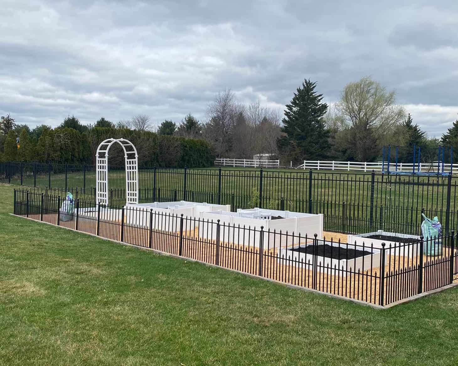 fence in a wide backyard