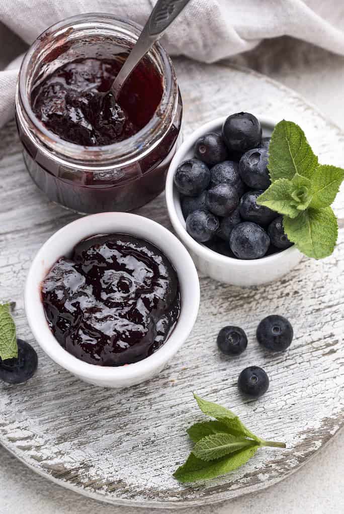 Flat lay delicious blueberry jam
