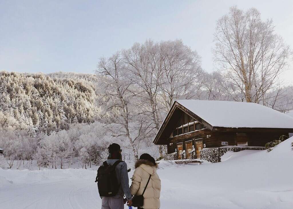 a couple taking a winter hike