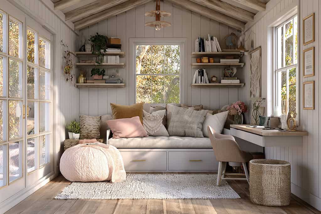 a she shed that features clever storage furniture with dual purposes.