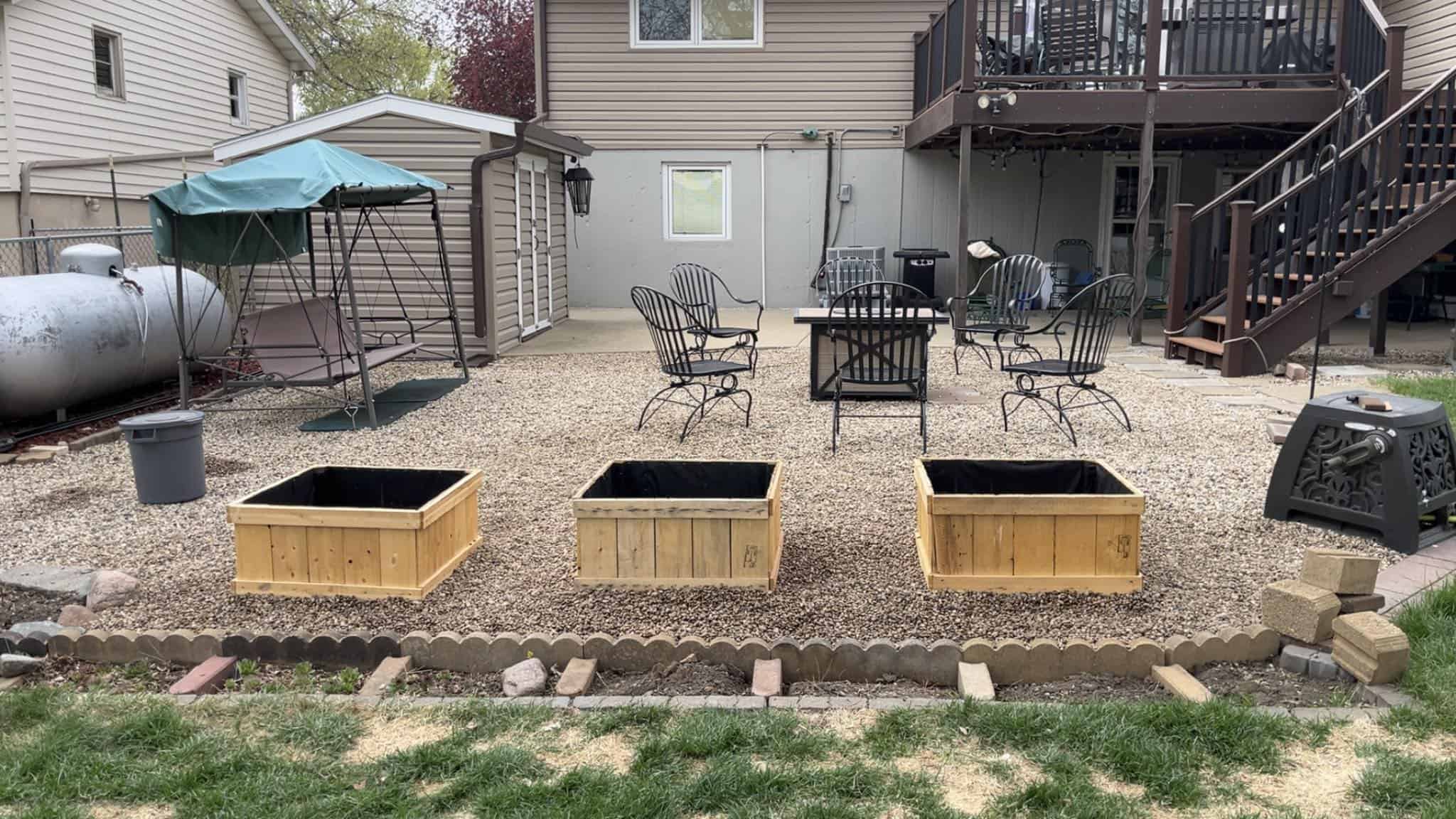 outdoor backyard scene showcasing a cozy patio with modern rustic elements