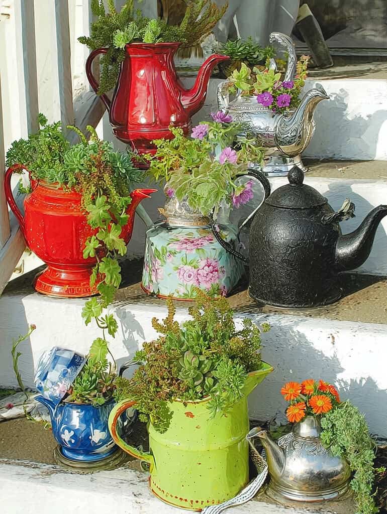 a charming white cottage-style front porch on a sunny summer day